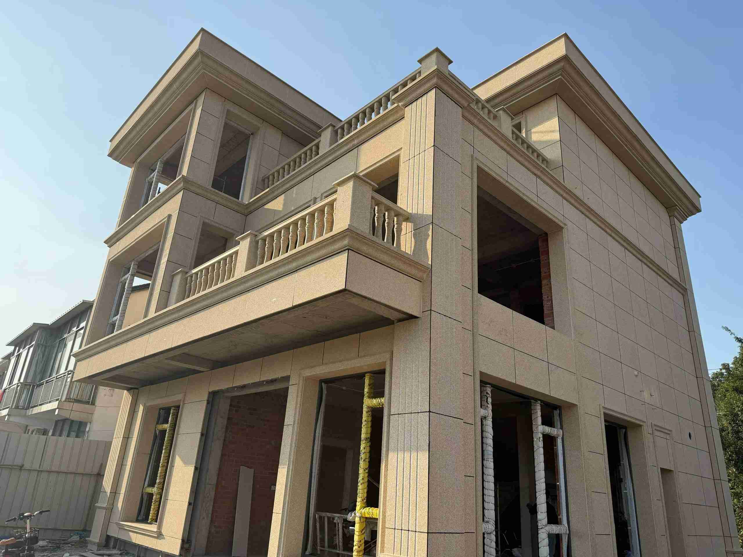 合肥 黄金麻花岗岩石材荔枝面外墙干挂效果展示